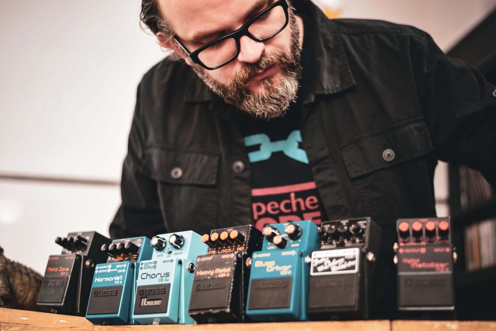 Producer Tom Dalgety at his Psalm Studios with collection of BOSS pedals