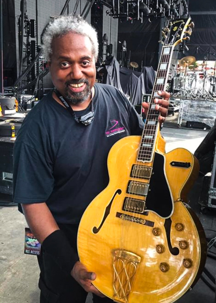 Andre Cholmondeley holding Steve Howe's late '50s triple PAF-equipped ES-5 Switchmaster