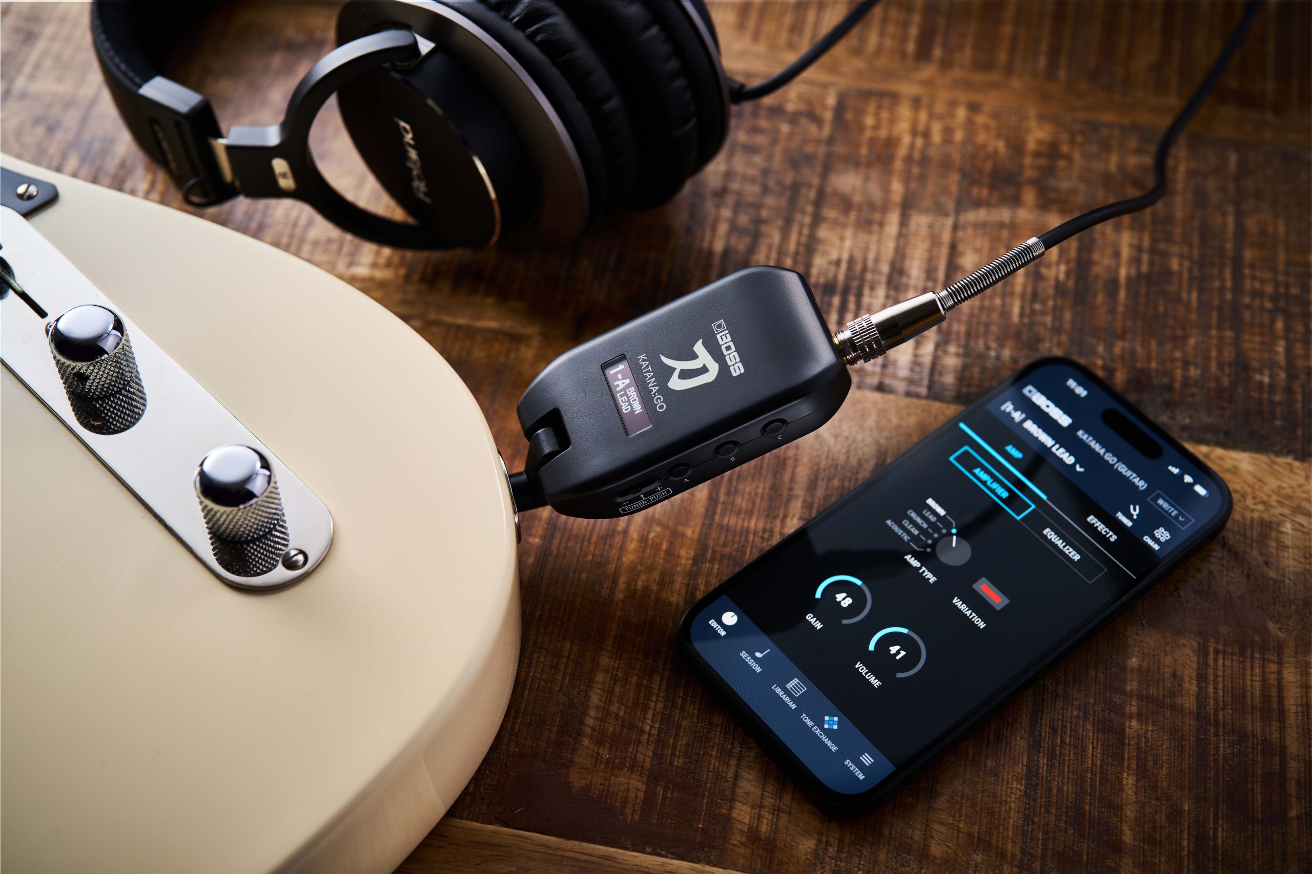 KATANA:GO plugged into a Telecaster with headphones and mobile app
