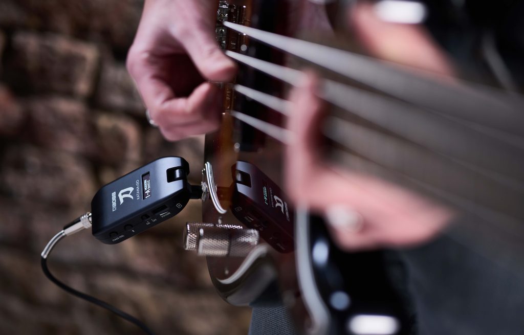 BOSS KATANA:GO Personal Headphone Guitar Amplifier plugged. into electric bass guitar