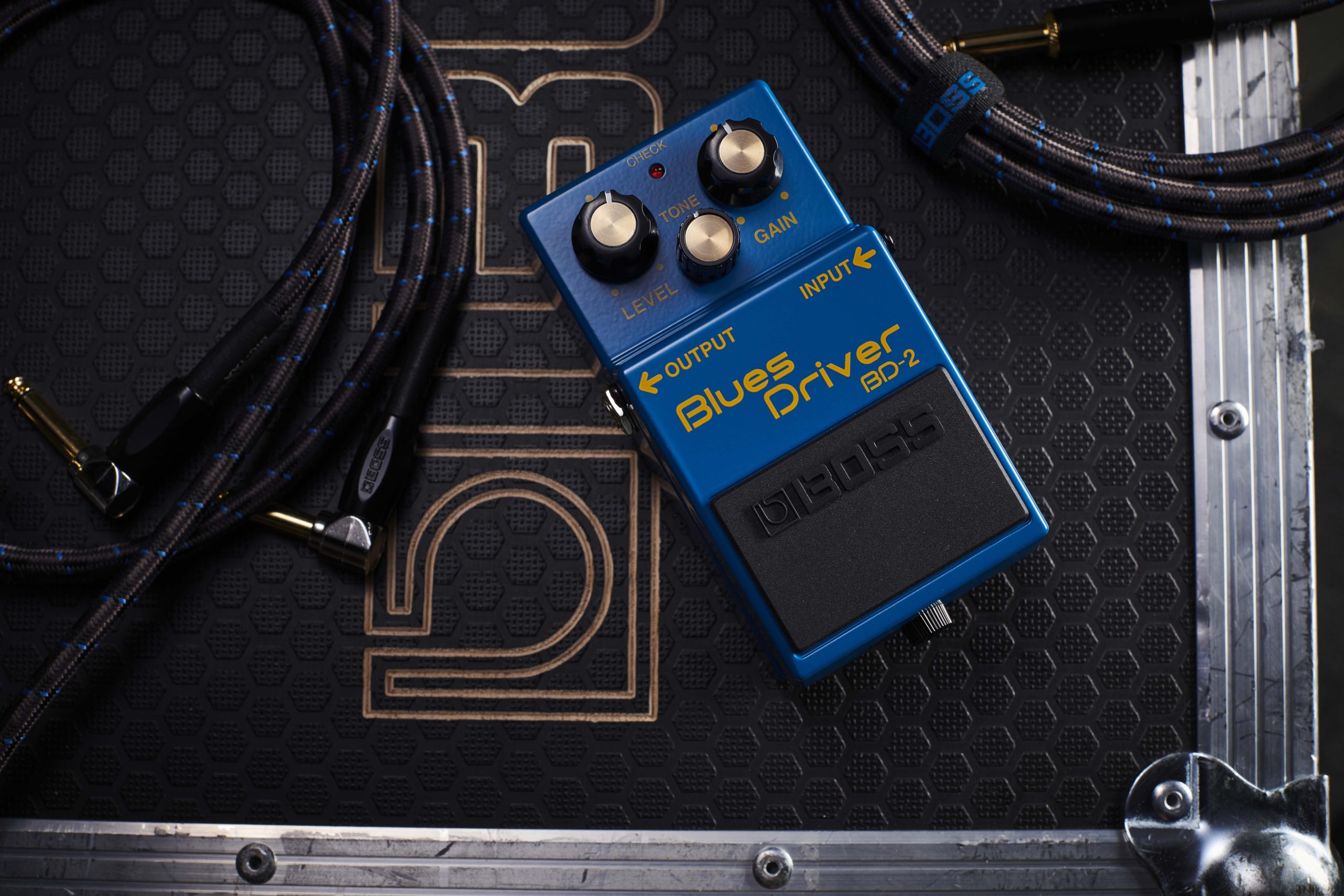BOSS BD-2 Blues Driver atop a flight case with cable