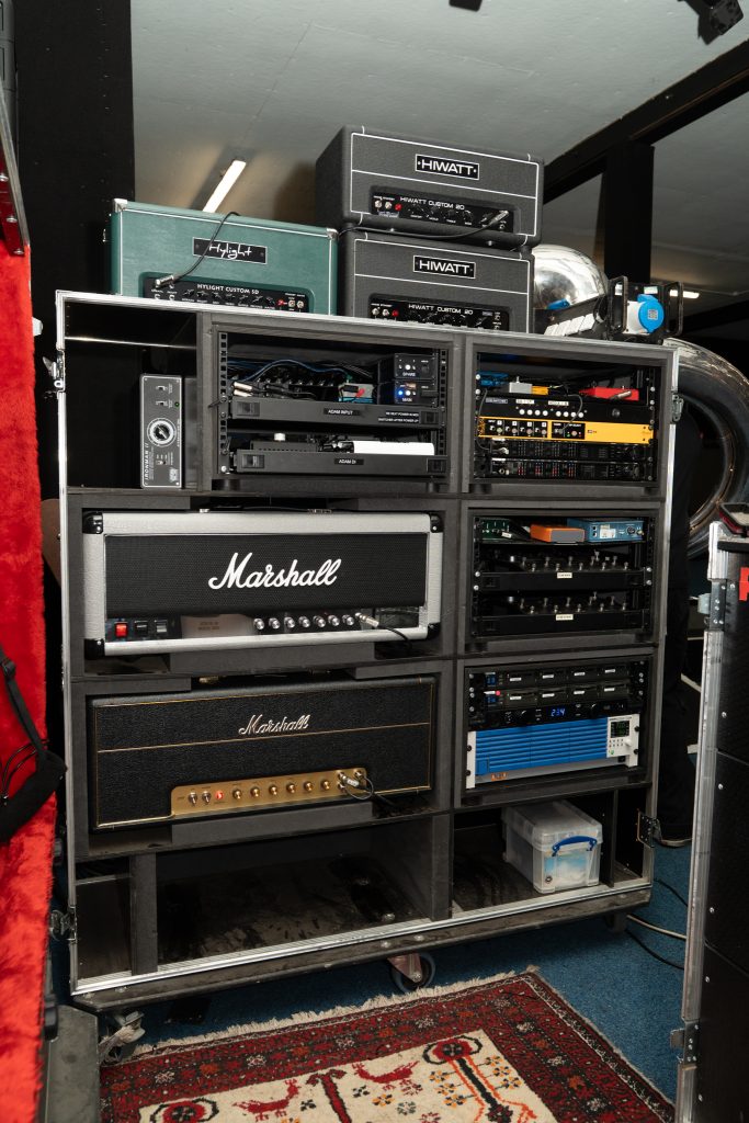 Yungblud lead guitarist Adam Warrington's stereo amp rig comprising Hiwatt Custom 20, Marshall Silver Jubilee, and Marshall 1959 Super Lead amp heads.