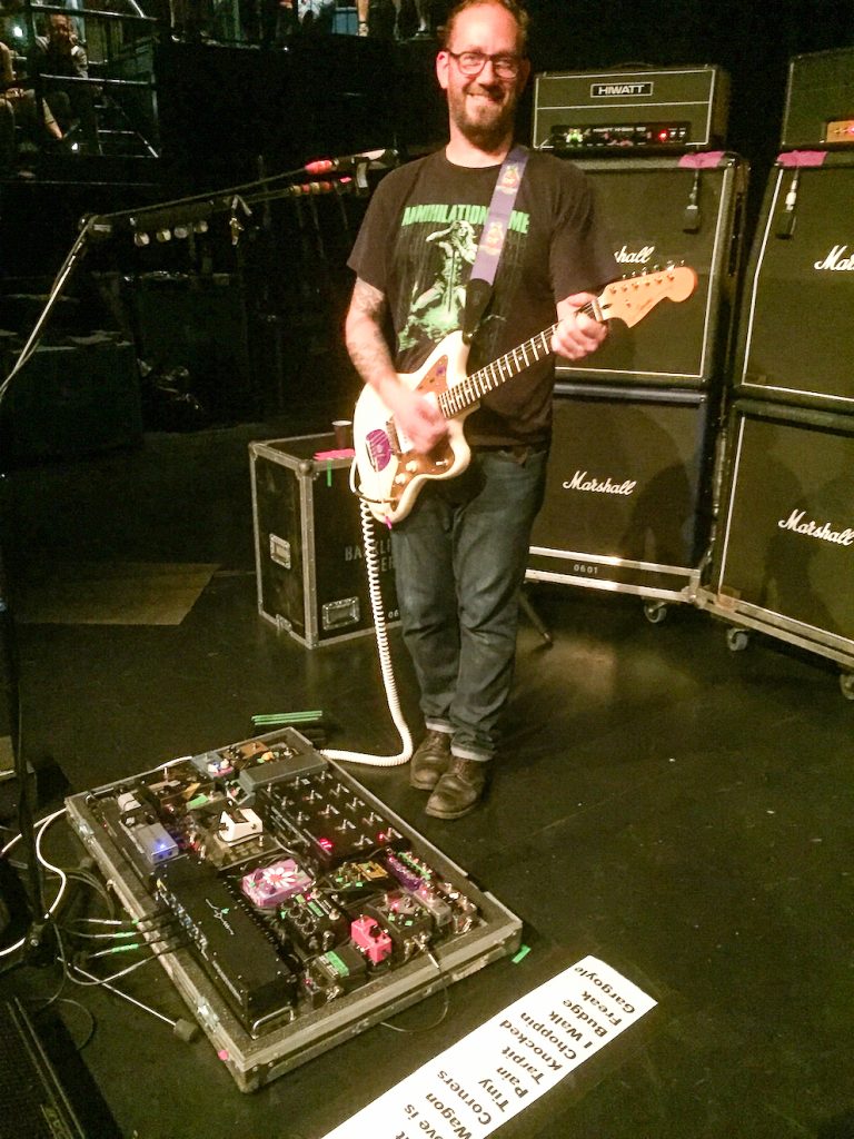 Guitar tech Mattias Johansson with Dinosaur Jr. vocalist/guitarist J Mascis's rig.