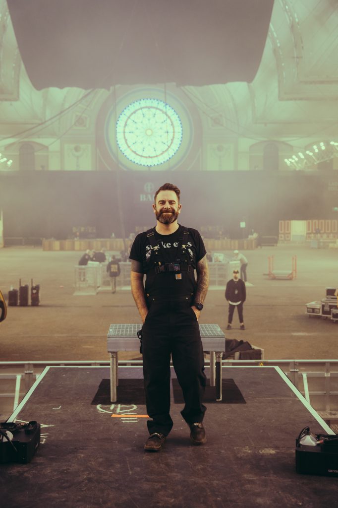 Dean Rowbotham of DR Guitars at Alexandra Palace, London with While She Sleeps