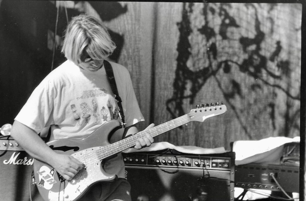Echo & the Bunnymrn guitarist Will Sergeant pictured in the mid-1980s playing with a Roland JC-120 Jazz Chorus amplifer